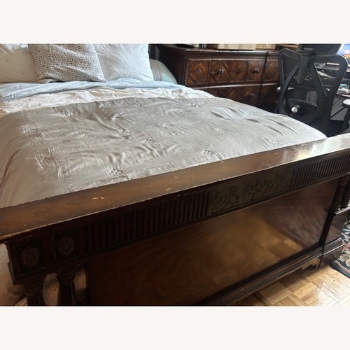 Used Theodore Alexander Dark Brown Wood Queen Bed for sale on AptDeco