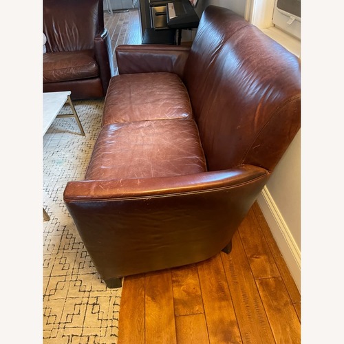 Used Crate & Barrel Dark Brown Leather Loveseat for sale on AptDeco