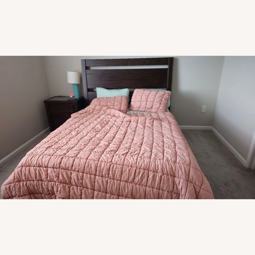 Used Ashley Starmore Dark Brown Wood Queen Bed for sale on AptDeco