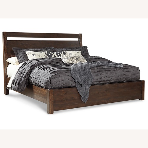 Used Ashley Starmore Dark Brown Wood Queen Bed for sale on AptDeco