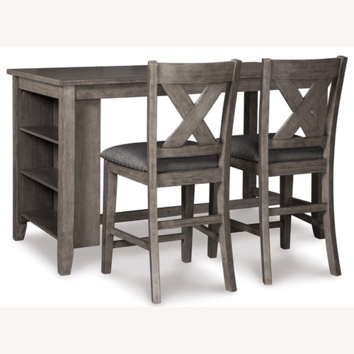 Used Ashley Caitbrook Brown Dining Set 2 Bar stools for sale on AptDeco