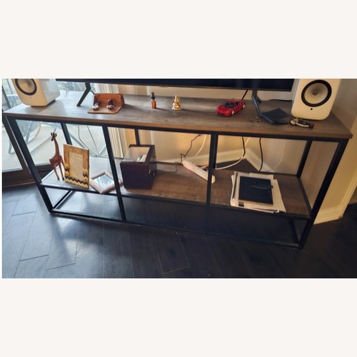 Used Ashley Wadeworth Light Brown 65" TV Stand for sale on AptDeco