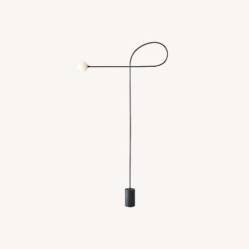 Used Bow Black Metal Floor Lamp for sale on AptDeco
