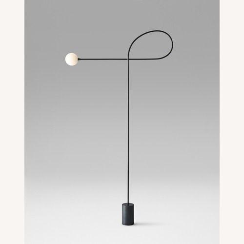Used Bow Black Metal Floor Lamp for sale on AptDeco