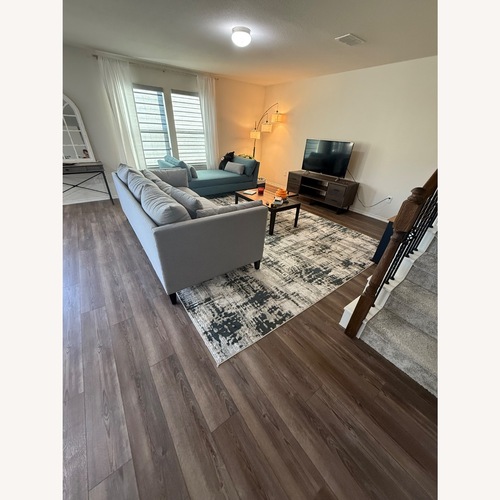 Used Light Gray Area Rug 10' x 13' for sale on AptDeco