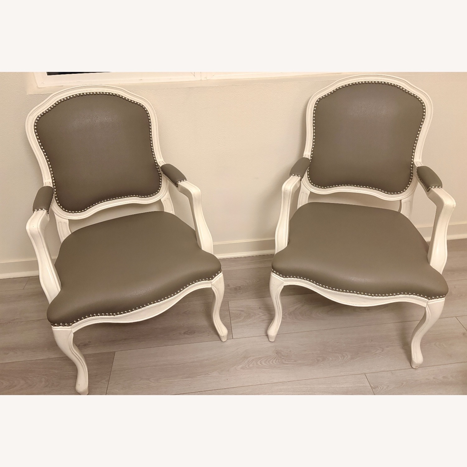 CB2 Stick Around Dark Gray Leather Accent Chairs - image-1