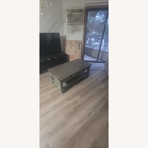Used Light Gray Wood Coffee Table for sale on AptDeco