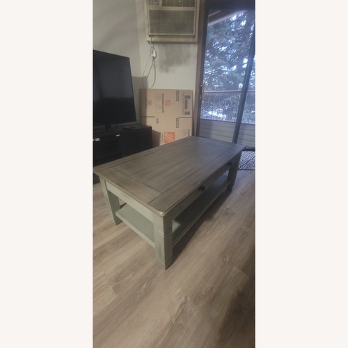 Used Light Gray Wood Coffee Table for sale on AptDeco