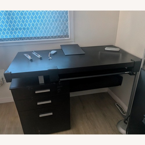 Used Amazon Dark Brown Wood Desk for sale on AptDeco
