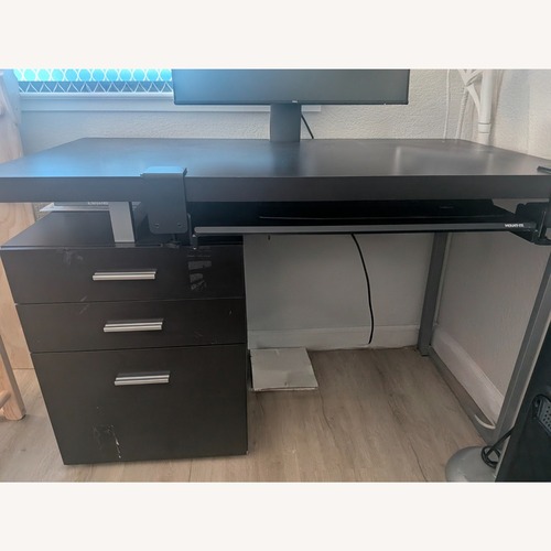 Used Amazon Dark Brown Wood Desk for sale on AptDeco