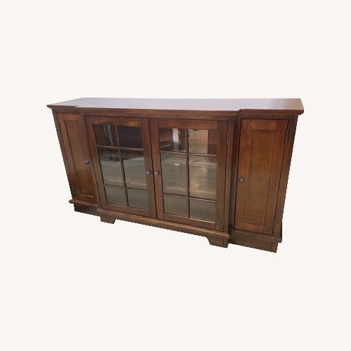 Used Ashley Solid Wood 4-Door Tv Stand Media Console for sale on AptDeco