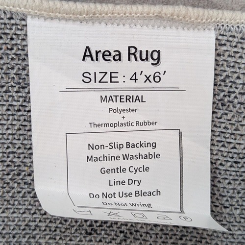 Used Modern Abstract Grey and Blue 4x6 Area Rug for sale on AptDeco