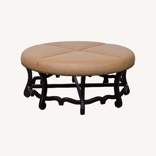 Used Round Leather Ottoman with Wood Base	 for sale on AptDeco