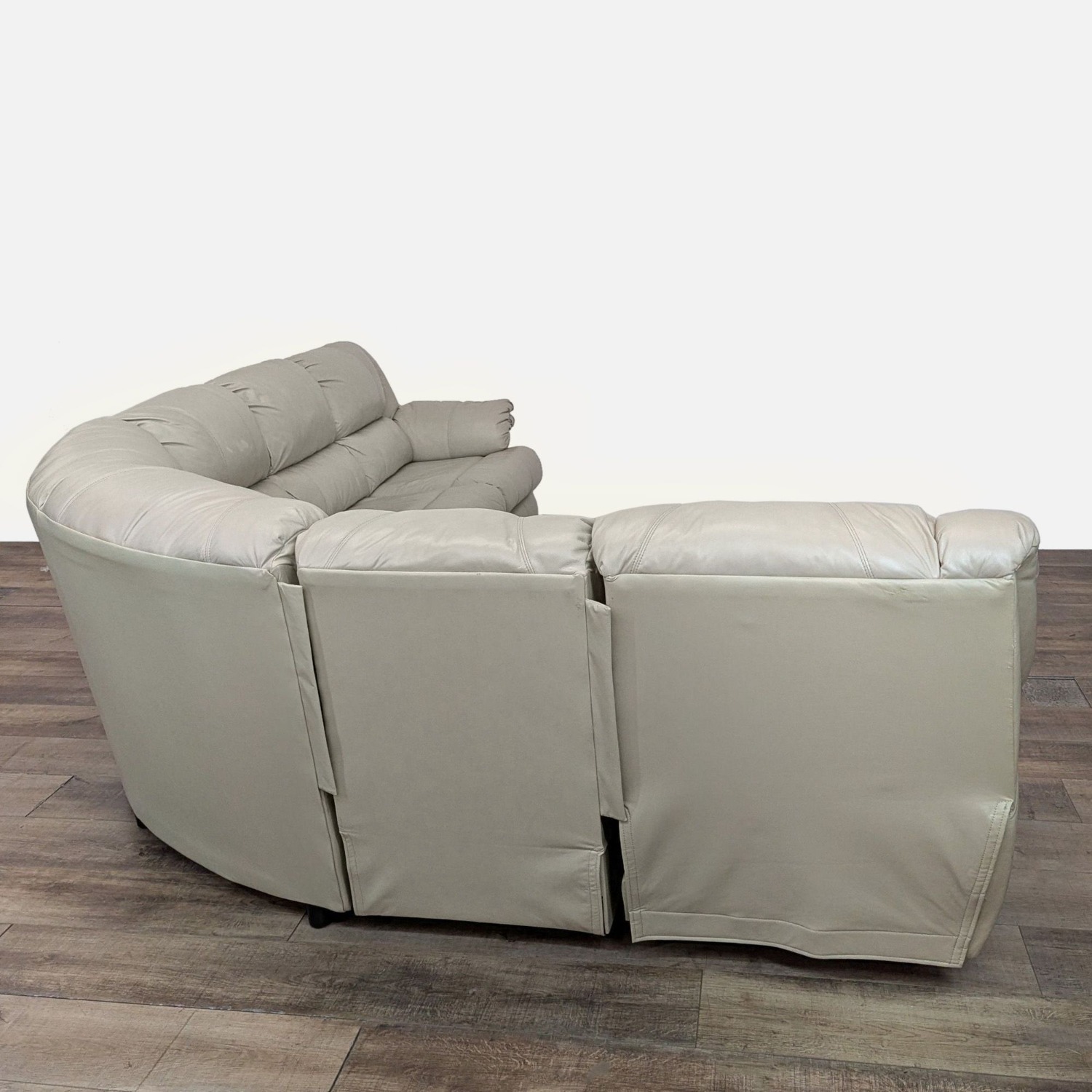 Ashley Leather Sectional with Recliner and Sleeper - image-4