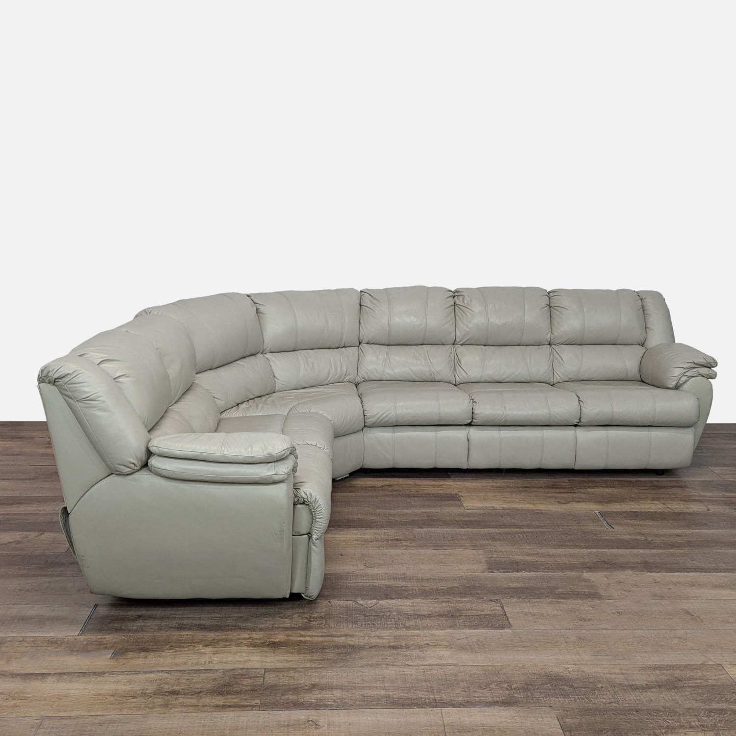 Ashley Leather Sectional with Recliner and Sleeper - image-2