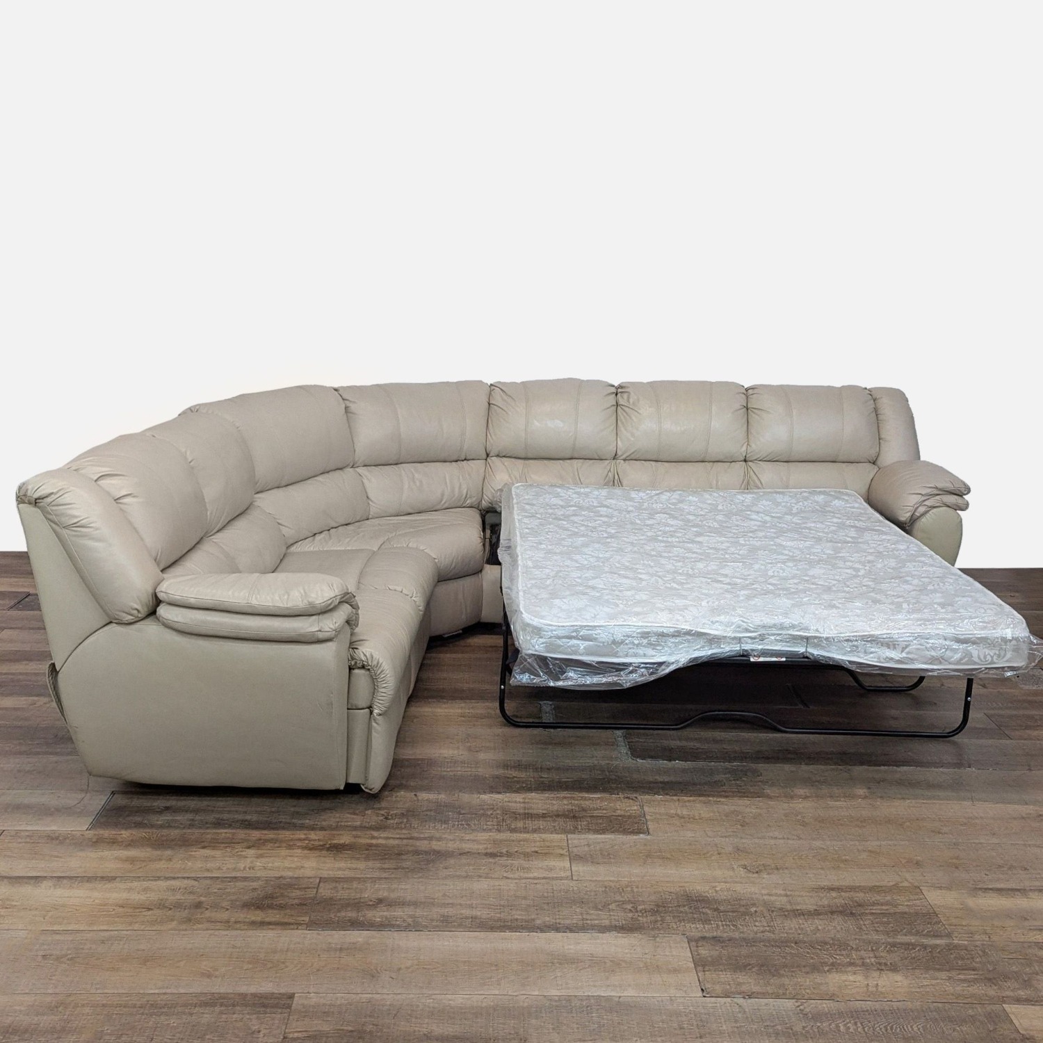 Ashley Leather Sectional with Recliner and Sleeper - image-8