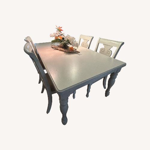 Used White Wood Dining Set with 4 Chairs and 2 Leafs for sale on AptDeco