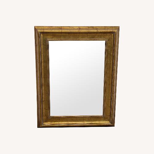 Used Uttermost Antiqued Gold Framed Wall Mirror for sale on AptDeco