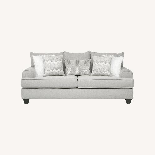 Used RoomsTo Go Gray East Bank Sofa for sale on AptDeco