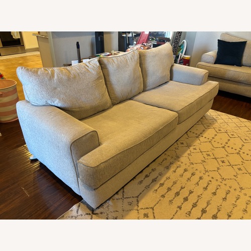 Used RoomsTo Go Gray East Bank Sofa for sale on AptDeco