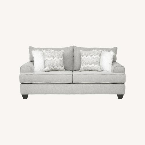 Used Rooms To Go  East Bank Light Gray Loveseat for sale on AptDeco