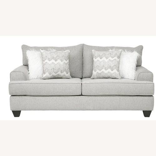 Used Rooms To Go  East Bank Light Gray Loveseat for sale on AptDeco