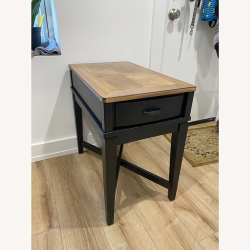 Used Black Wood Nightstand for sale on AptDeco