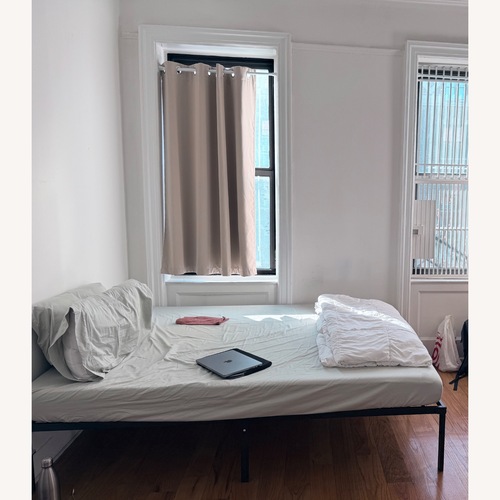 Used Blackout Beige Curtains With Rod for sale on AptDeco