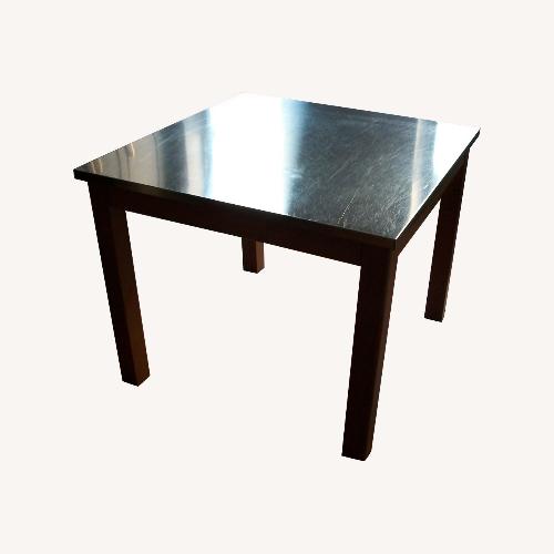 Used Vintage Square Stainless Steel Dining Table for sale on AptDeco