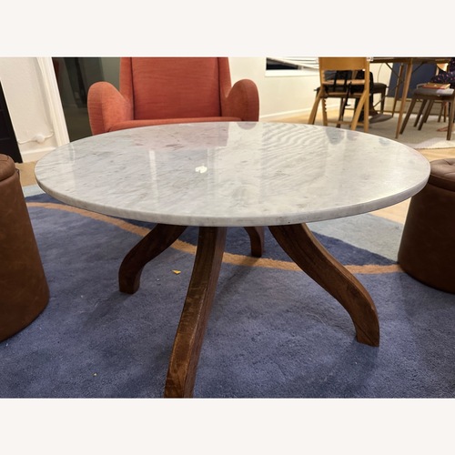 Used Pier 1 Imports Natural Marble Coffee Table for sale on AptDeco