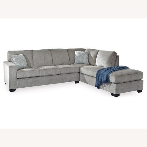 Used Ashley Furniture Natural 2 Piece Sectional for sale on AptDeco