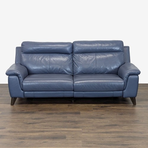 Used Living Spaces Moana Blue Leather Reclining Sofa for sale on AptDeco
