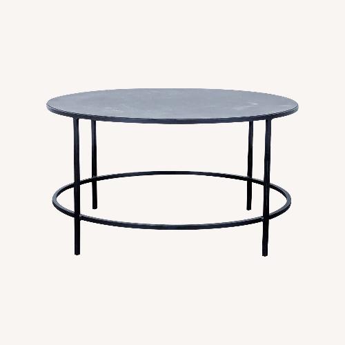 Used Room & Board Slim Round Coffee Table for sale on AptDeco