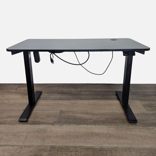 Used Maidesite Electric Height Adjustable Standing Desk for sale on AptDeco