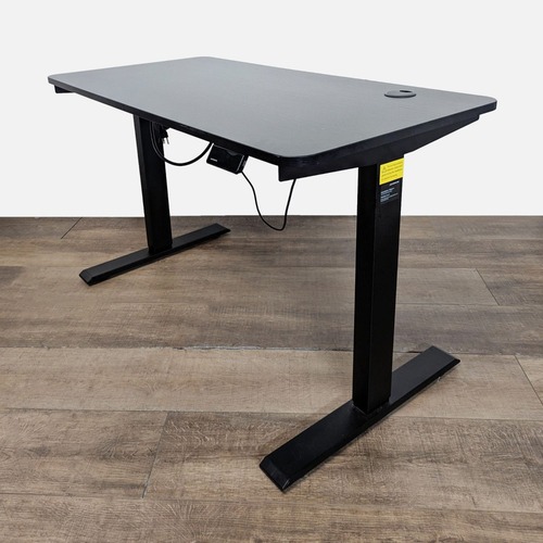 Used Maidesite Electric Height Adjustable Standing Desk for sale on AptDeco