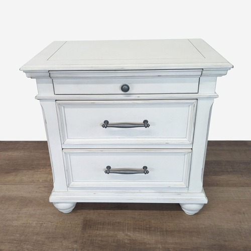 Used Ashley Furniture Kanwyn Three Drawer Nightstand for sale on AptDeco