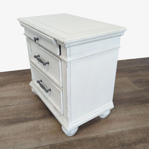 Used Ashley Furniture Kanwyn Three Drawer Nightstand for sale on AptDeco