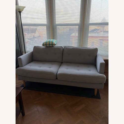 Used Modern Light Gray Fabric Loveseat with Wooden Legs for sale on AptDeco