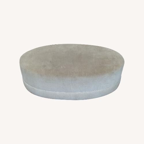 Used Oval Fabric Covered Ottoman for sale on AptDeco