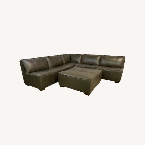 Used Raymour and Flanigan Burchill Leather Sectional for sale on AptDeco