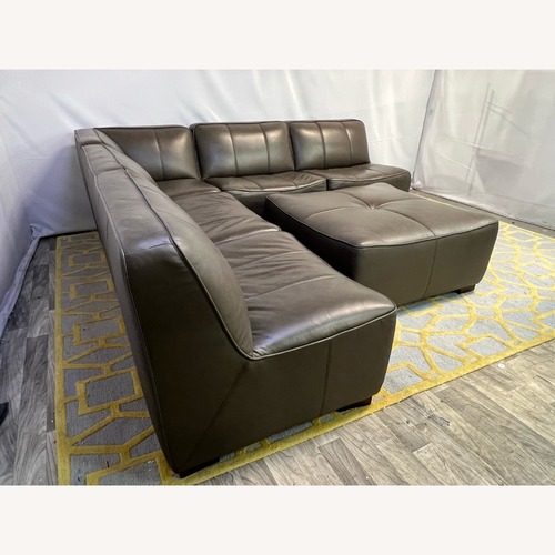 Used Raymour and Flanigan Burchill Leather Sectional for sale on AptDeco