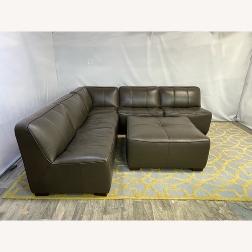 Used Raymour and Flanigan Burchill Leather Sectional for sale on AptDeco