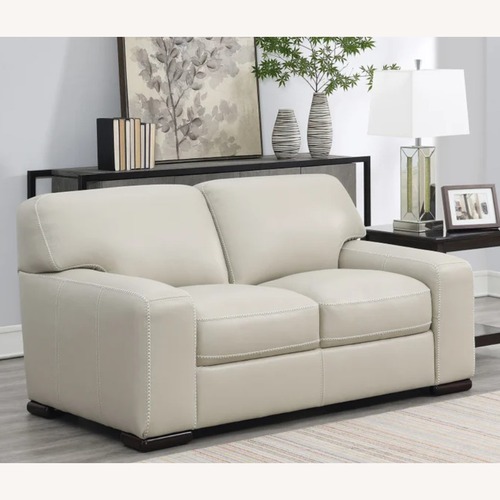 Used Buckley Beige Leather Loveseat for sale on AptDeco