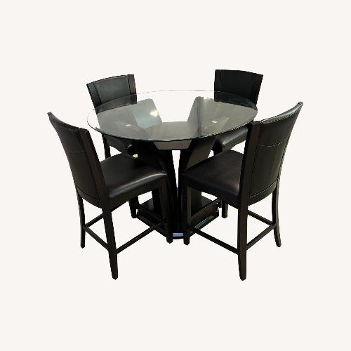 Used Raymour and Flanigan Venice Dining Set for sale on AptDeco
