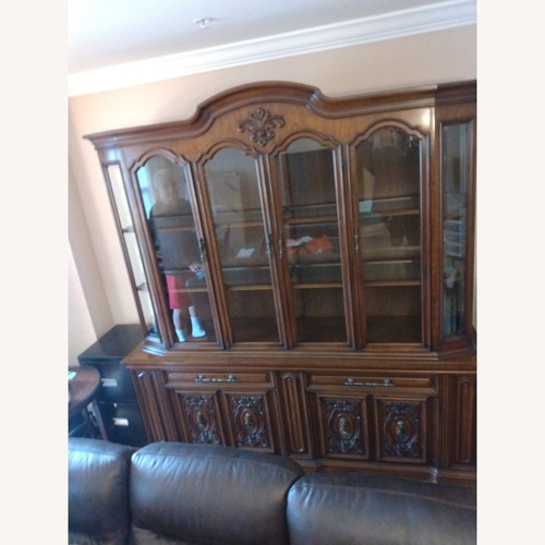 Used Dark Brown Wood Wall Unit for sale on AptDeco