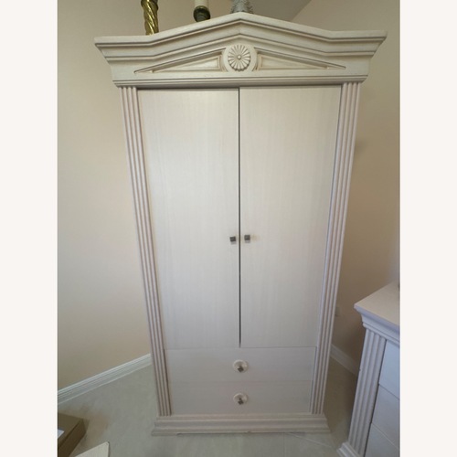 Used Natural Wood Armoire for sale on AptDeco