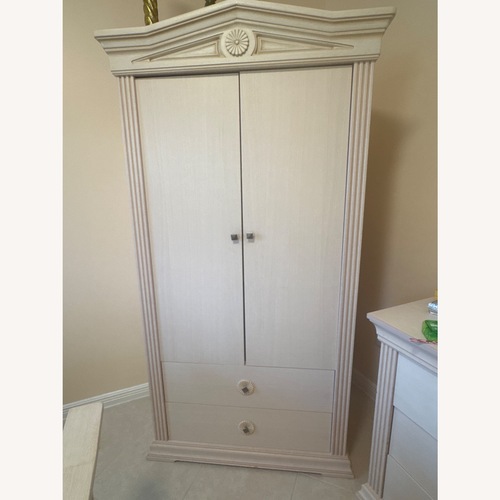 Used Natural Wood Armoire for sale on AptDeco