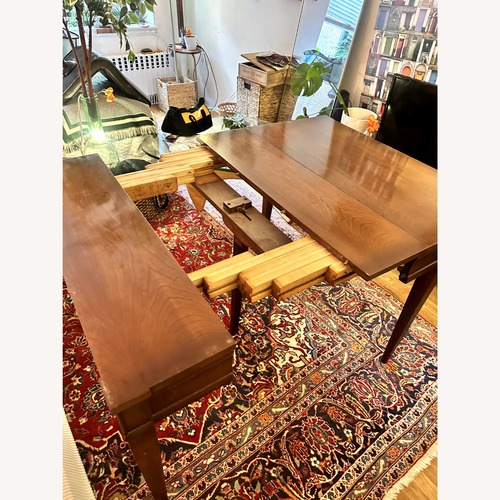 Used Vintage/Antique Dark Brown Wood Dining Table for sale on AptDeco