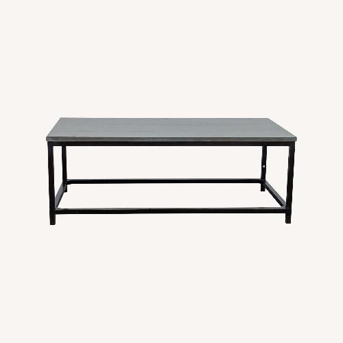 Used Wood Top Coffee Table on Metal Frame	 for sale on AptDeco