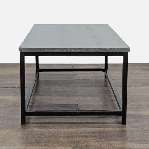 Used Wood Top Coffee Table on Metal Frame	 for sale on AptDeco